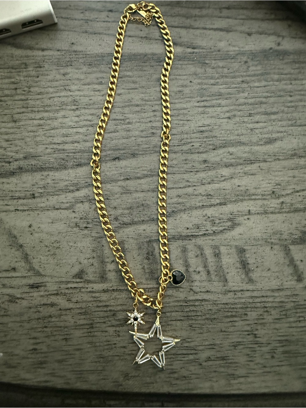 Gold-Tone Star Charm Necklace with Black Accent